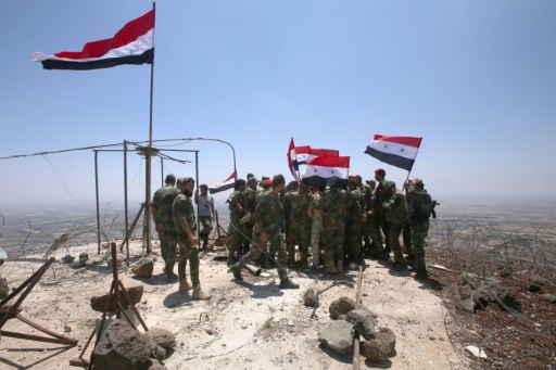  The regime raises the Syrian flag to the border of the occupied Golan by Israel "title =" The regime raises the Syrian flag to the border of the Golan occupied by Israel "/>


<p> Regime forces wield Syrian flags after Qur'neitra rebels are rebuked on July 19, 2018Youssef KARWASHAN </p>
</p></div>
<div id=